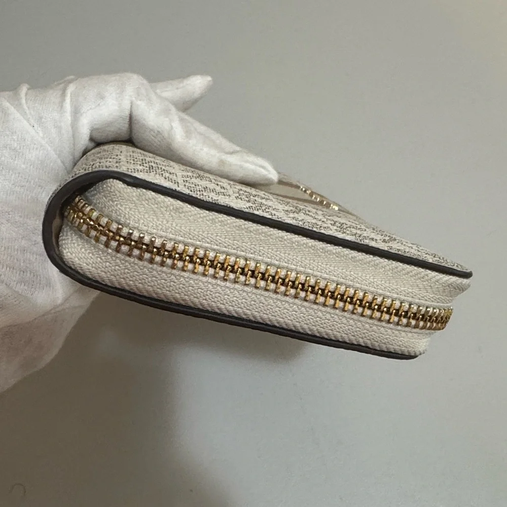 Michael Kors Cream and Gold Zip-Around Wallet - Picture 10 of 11